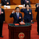 Newly elected Vice Premiers (L-R) Hu Chunhua, Han Zheng, Sun Chunlan and Liu He take an oath to the constitution at the seventh plenary session of the National People's Congress (NPC) at the Great Hall of the People in Beijing, China March 19, 2018.